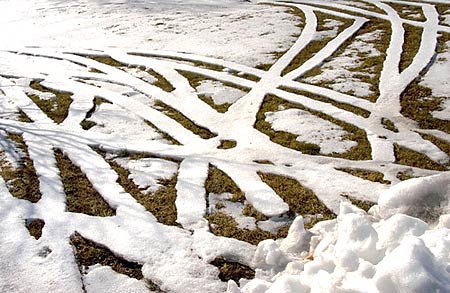 photo: tire tracks in the snow, off the pavement