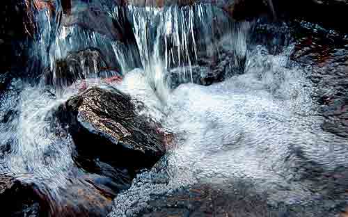 water falling on rock