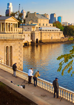 Philadelphia Water Works at sunset with fishermen