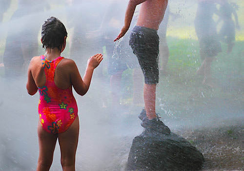 children playing in fire hydrant