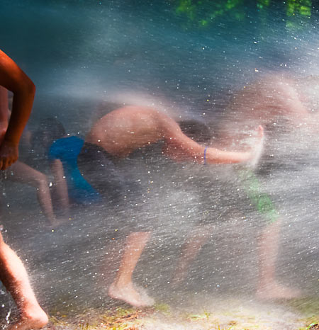 children in firehydrant spray