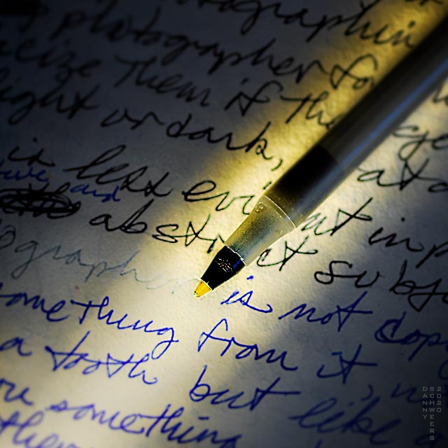 Photograph of an empty ballpoint pen and the page where it ran out of ink by Danny N. Schweers.