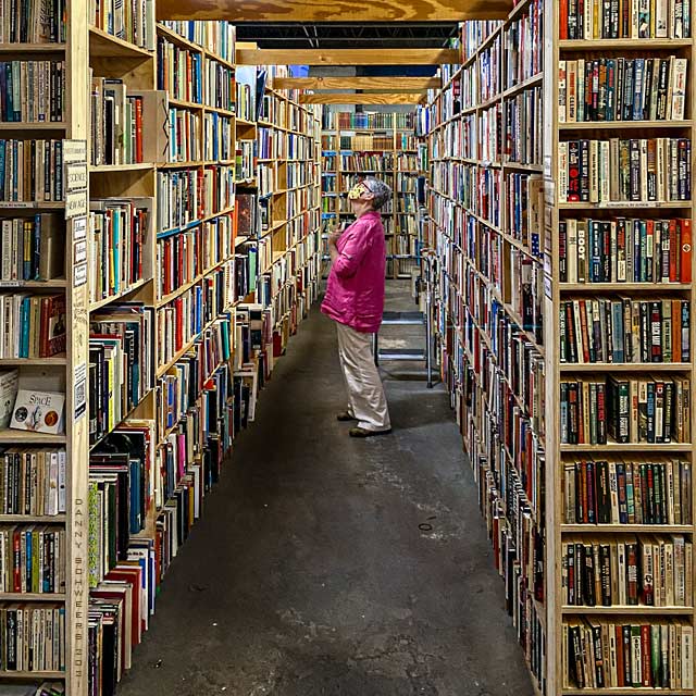 Photo of the artist’s wife at Cupboardmaker’s Bookstore, Enola, Pennsylvania copyright 2021 by Danny N. Schweers.