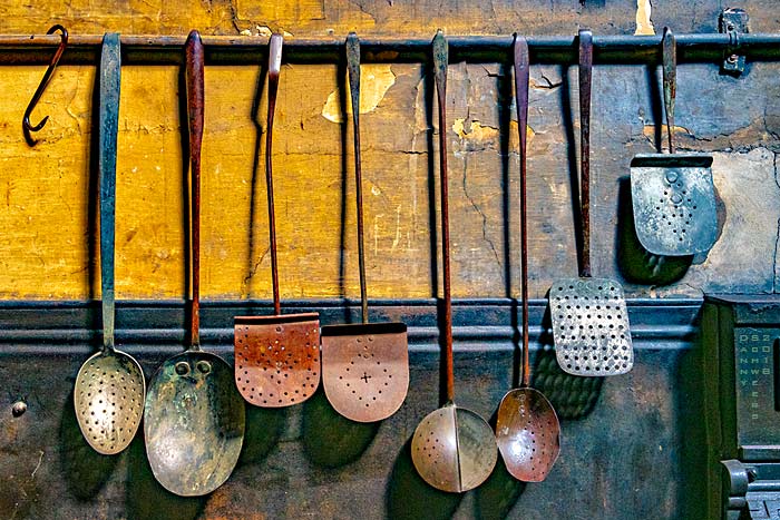 Photo of cooking utensils in the kitchen at Brodsworth Hall, South Yorkshire, England.